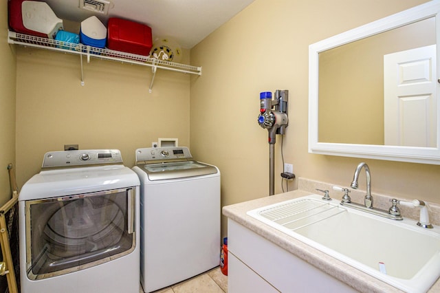 231 Grandview Rd, Conway, NH 03818 - laundry area with washer and clothes dryer and light tile patterned floors
