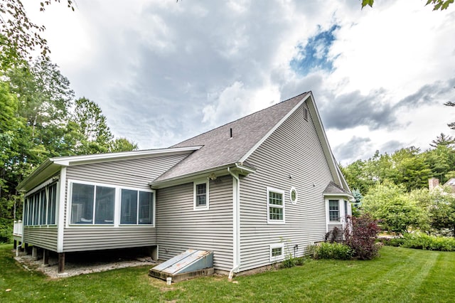 231 Grandview Rd, Conway, NH 03818 - rear view of house featuring a shingled roof and a lawn