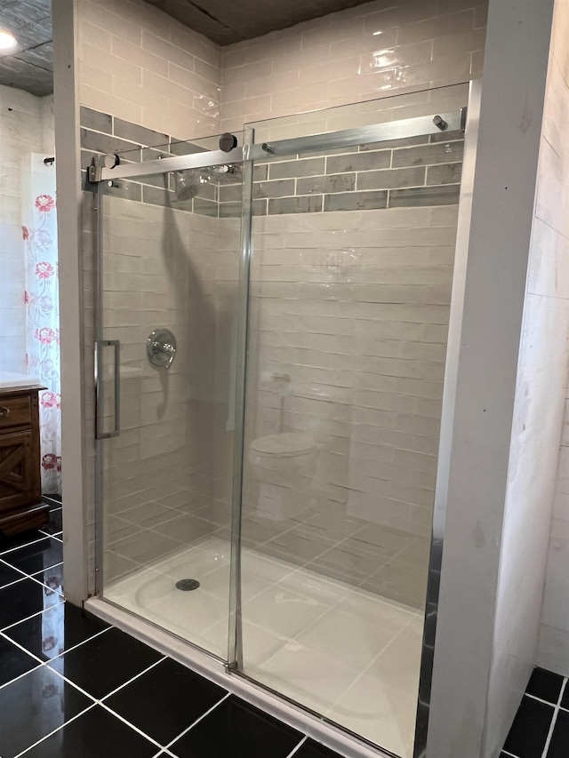 249 Ward Rd, Poultney, VT 05764 - full bathroom featuring a shower stall, tile patterned flooring, and vanity