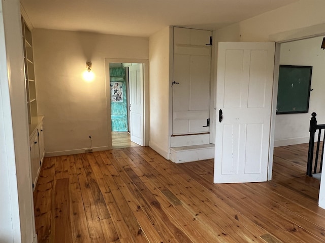 249 Ward Rd, Poultney, VT 05764 - spare room featuring hardwood / wood-style floors and baseboards