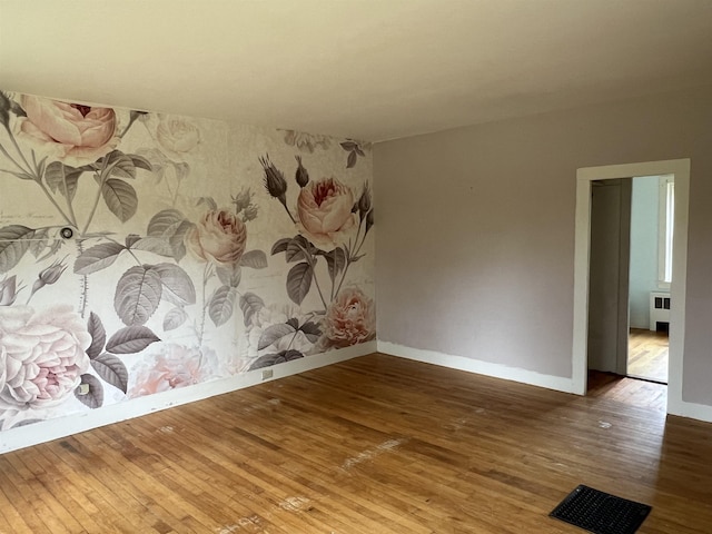 249 Ward Rd, Poultney, VT 05764 - spare room featuring wood-type flooring and baseboards