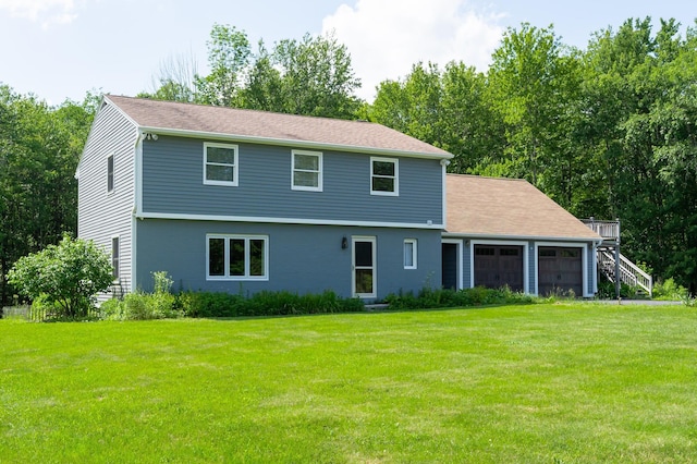 153 Mudgett Hill Rd, Loudon, NH 03307 - view of front of house with an attached garage, a front lawn, and stairs