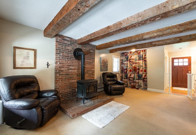 153 Mudgett Hill Rd, Loudon, NH 03307 - carpeted living area with a wood stove and beam ceiling