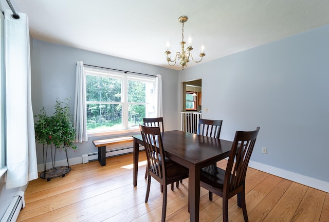 153 Mudgett Hill Rd, Loudon, NH 03307 - dining area featuring baseboard heating, a chandelier, and light wood-style flooring