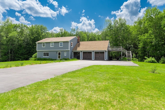 153 Mudgett Hill Rd, Loudon, NH 03307 - view of front of house with an attached garage, stairway, driveway, and a front yard