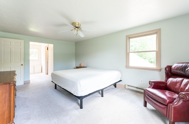 153 Mudgett Hill Rd, Loudon, NH 03307 - bedroom featuring baseboard heating, light carpet, multiple windows, and ceiling fan