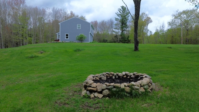 153 Mudgett Hill Rd, Loudon, NH 03307 - view of green lawn with a fire pit and a wooded view