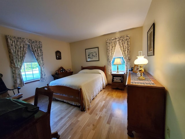 381 Cross Ave Unit 9, 10, Saint Johnsbury, VT 05819 - bedroom with light wood-style flooring and baseboards