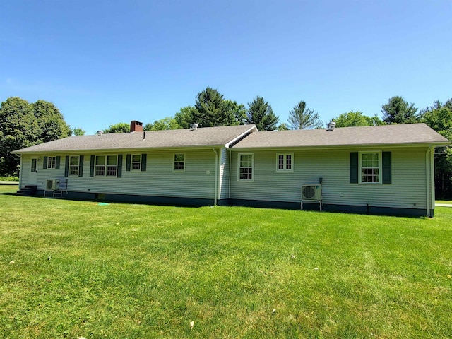 381 Cross Ave Unit 9, 10, Saint Johnsbury, VT 05819 - rear view of house with a yard