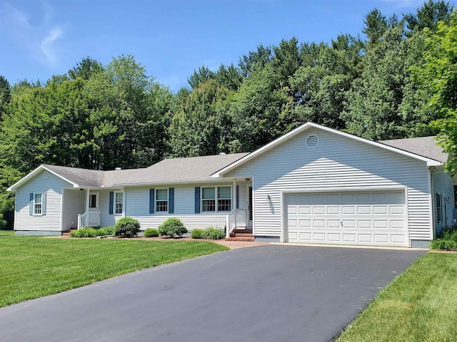 381 Cross Ave Unit 9, 10, Saint Johnsbury, VT 05819 - ranch-style home featuring a garage, driveway, a front yard, and roof with shingles