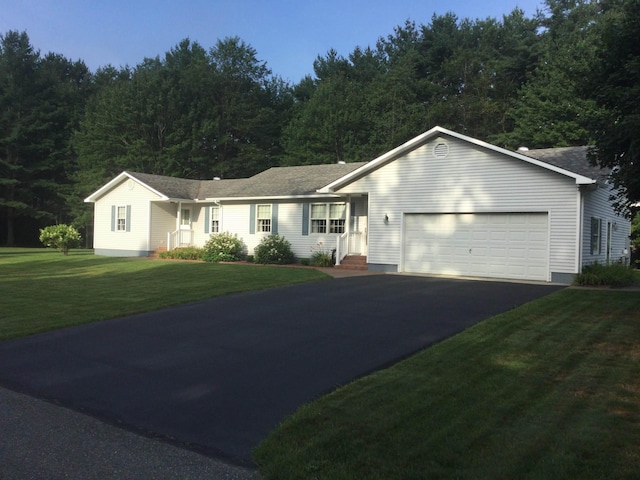 381 Cross Ave Unit 9, 10, Saint Johnsbury, VT 05819 - ranch-style house featuring a garage, driveway, and a front lawn