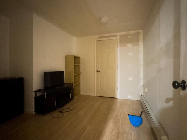 1 Wyeth Farm Cir, Lebanon, NH 03784 - interior space featuring wood finished floors and a baseboard heating unit