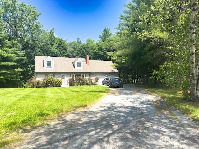 1 Wyeth Farm Cir, Lebanon, NH 03784 - cape cod-style house with asphalt driveway, a garage, a front lawn, and a chimney