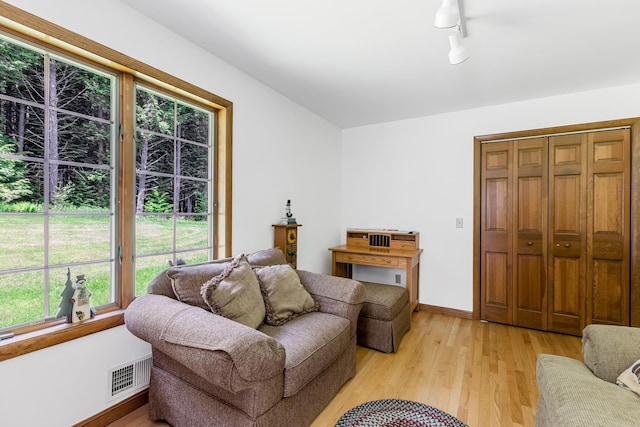 490 W Hill Rd, Ludlow, VT 05149 - living room with light wood-style floors and baseboards