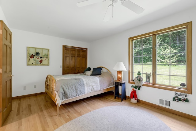 490 W Hill Rd, Ludlow, VT 05149 - bedroom featuring light wood-type flooring, a closet, and ceiling fan