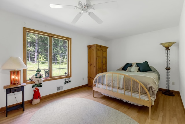 490 W Hill Rd, Ludlow, VT 05149 - bedroom with wood finished floors and a ceiling fan