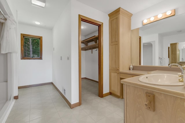 490 W Hill Rd, Ludlow, VT 05149 - bathroom featuring vanity and tile patterned floors