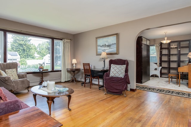 3 Mooreland Ave, Concord, NH 03301 - living room with wood finished floors and arched walkways