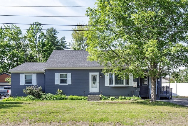 6 Hobart St, Concord, NH 03303 - view of front of home featuring roof with shingles, a front yard, and entry steps