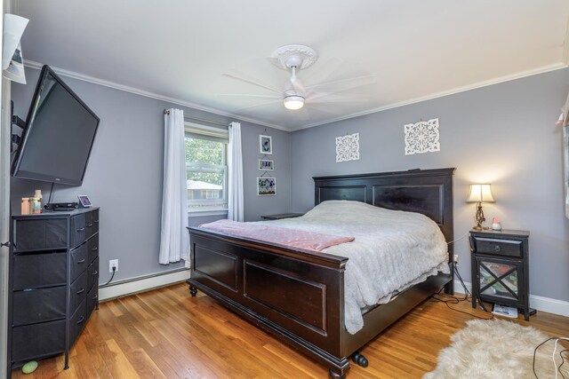 6 Hobart St, Concord, NH 03303 - bedroom with a baseboard radiator, light wood finished floors, ornamental molding, and ceiling fan
