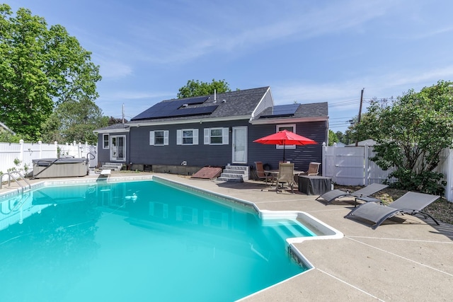 6 Hobart St, Concord, NH 03303 - view of swimming pool with entry steps, a patio area, a fenced backyard, and a hot tub