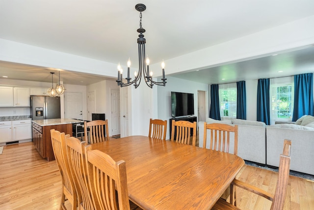 116 Sullivan Center Rd, Gilsum, NH 03448 - dining room featuring a chandelier and light wood-type flooring