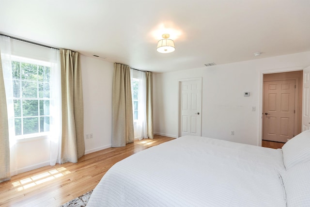 116 Sullivan Center Rd, Gilsum, NH 03448 - bedroom featuring light wood-style flooring and baseboards