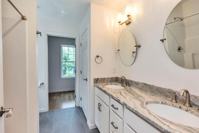116 Sullivan Center Rd, Gilsum, NH 03448 - full bath with double vanity, tile patterned floors, and a shower