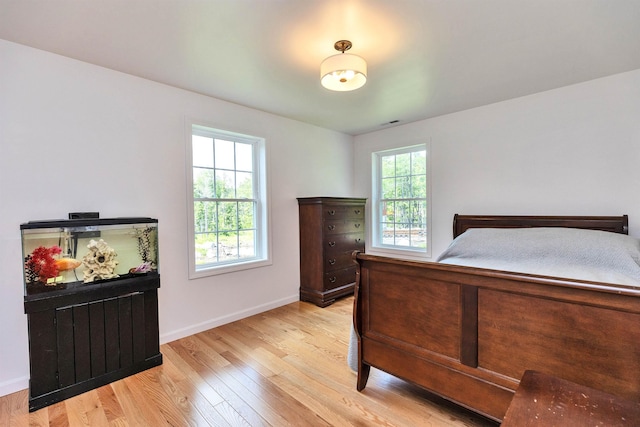 116 Sullivan Center Rd, Gilsum, NH 03448 - bedroom with light wood-style floors and baseboards