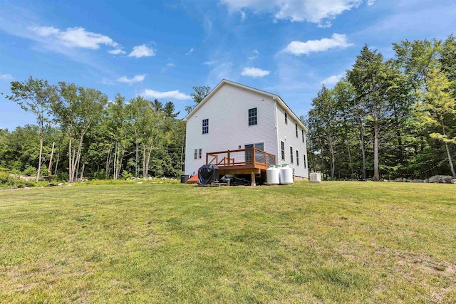 116 Sullivan Center Rd, Gilsum, NH 03448 - view of side of home with a lawn and a wooden deck