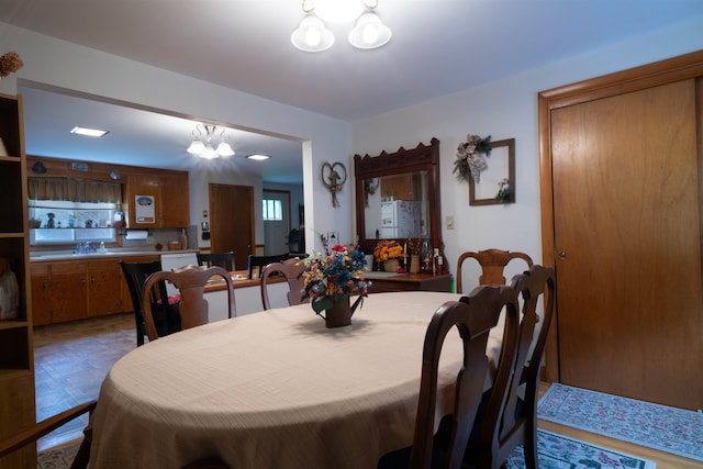 1061 Suncook Valley Rd, Barnstead, NH 03225 - dining space with a chandelier