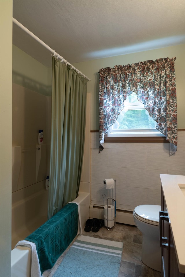 1061 Suncook Valley Rd, Barnstead, NH 03225 - full bathroom with vanity, shower / bathtub combination with curtain, tile walls, a wainscoted wall, and baseboard heating