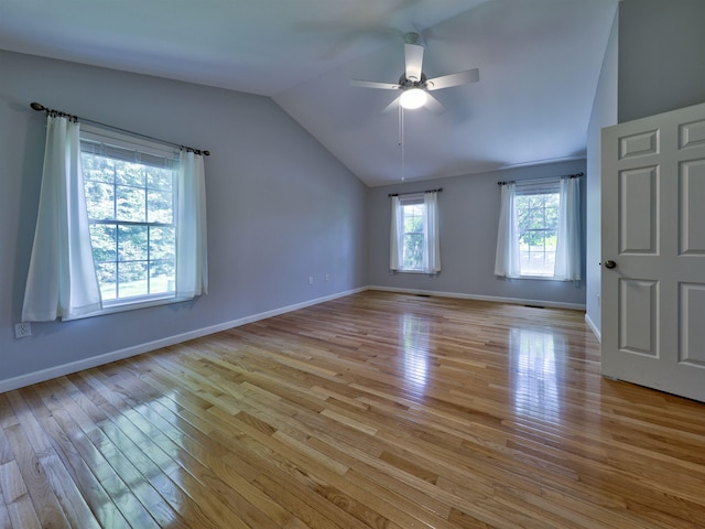 8 Sycamore Ct, Amherst, NH 03031 - unfurnished room with vaulted ceiling, light wood-style floors, and ceiling fan