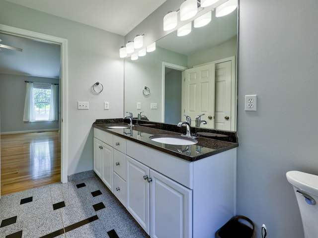 8 Sycamore Ct, Amherst, NH 03031 - full bathroom with double vanity and granite floors