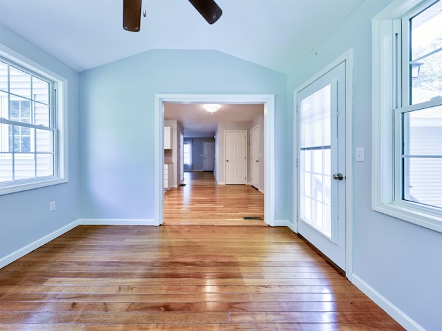 8 Sycamore Ct, Amherst, NH 03031 - empty room with wood-type flooring, ceiling fan, and vaulted ceiling