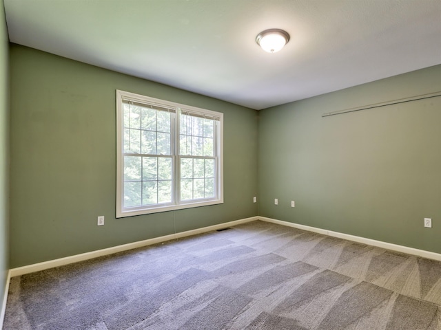 8 Sycamore Ct, Amherst, NH 03031 - carpeted spare room with baseboards