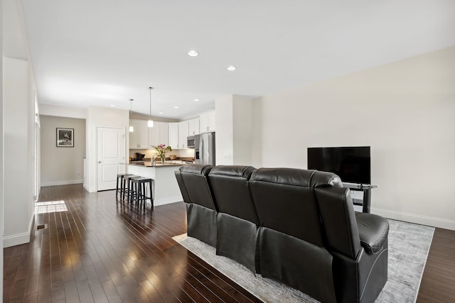 394 Zephyr Rd, Williston, VT 05495 - living area featuring dark wood-style floors and recessed lighting