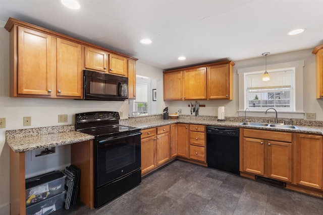 19 Baker St, Dover, NH 03820 - kitchen featuring black appliances, recessed lighting, light stone countertops, brown cabinetry, and pendant lighting