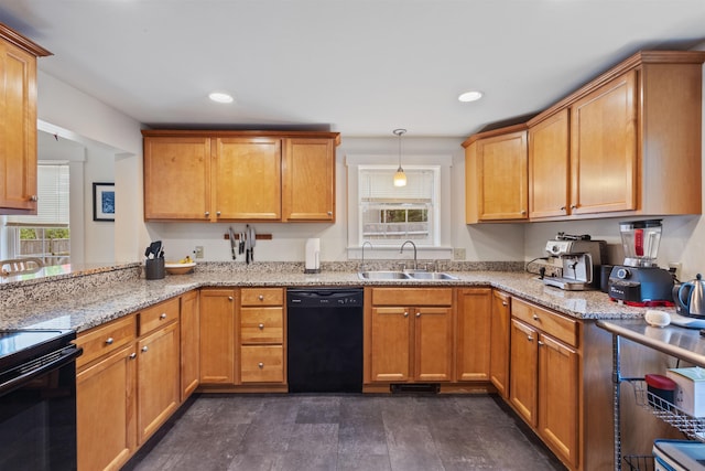19 Baker St, Dover, NH 03820 - kitchen with black appliances, plenty of natural light, light stone counters, and recessed lighting