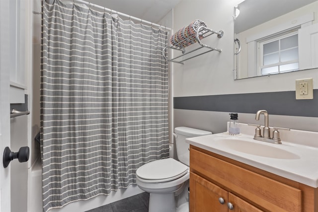 19 Baker St, Dover, NH 03820 - bathroom with vanity, tile patterned flooring, and shower / tub combo