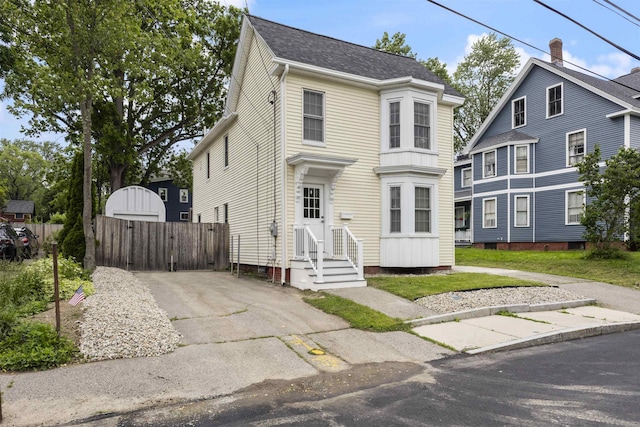 19 Baker St, Dover, NH 03820 - view of front of house with a gate