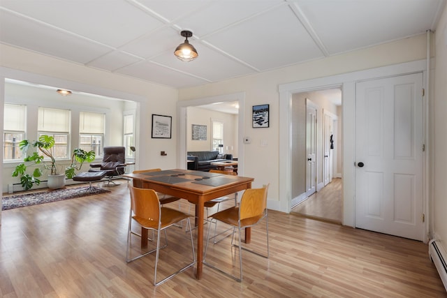 19 Baker St, Dover, NH 03820 - dining room featuring light wood-style floors and baseboard heating