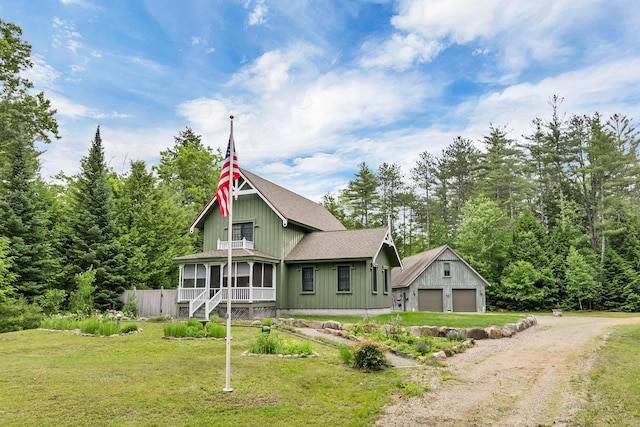 185 Huntress Bridge Rd, Effingham, NH 03882 - view of front of home featuring a garage, a front lawn, driveway, and a shingled roof