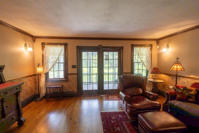 185 Huntress Bridge Rd, Effingham, NH 03882 - entryway with a wainscoted wall, wood finished floors, healthy amount of natural light, and ornamental molding