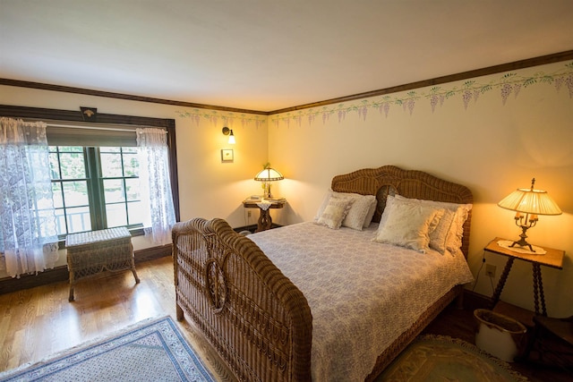 185 Huntress Bridge Rd, Effingham, NH 03882 - bedroom featuring wood finished floors and ornamental molding