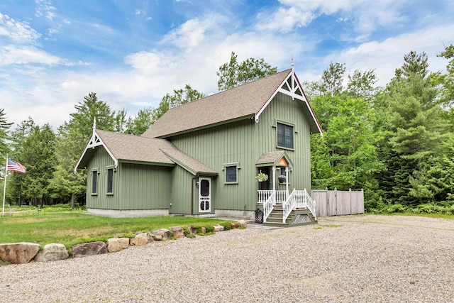 185 Huntress Bridge Rd, Effingham, NH 03882 - view of front facade with a shingled roof and board and batten siding