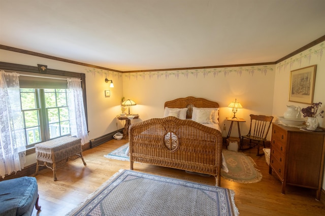 185 Huntress Bridge Rd, Effingham, NH 03882 - bedroom with ornamental molding, wood finished floors, and baseboard heating