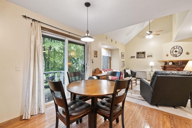 6 Cumberland Rd Unit 12, Gilford, NH 03249 - dining space featuring light wood-type flooring, vaulted ceiling, and a ceiling fan