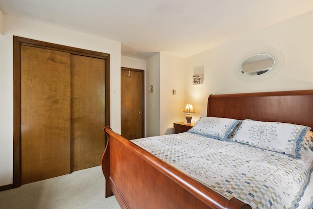 6 Cumberland Rd Unit 12, Gilford, NH 03249 - bedroom featuring light colored carpet and multiple closets