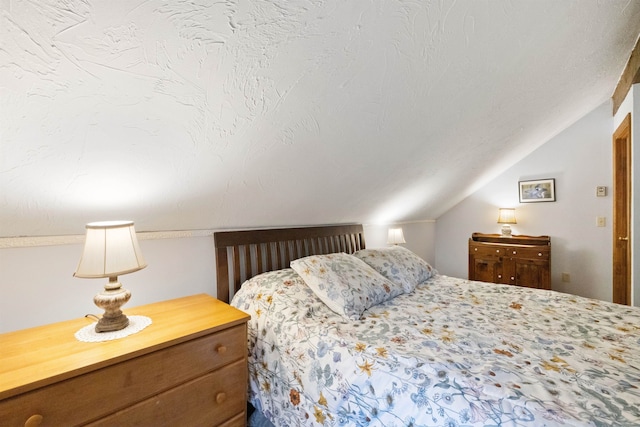 6 Cumberland Rd Unit 12, Gilford, NH 03249 - bedroom with lofted ceiling